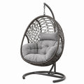 Polyrattan Hängesessel mit Stahlgestell und grauen Kissen